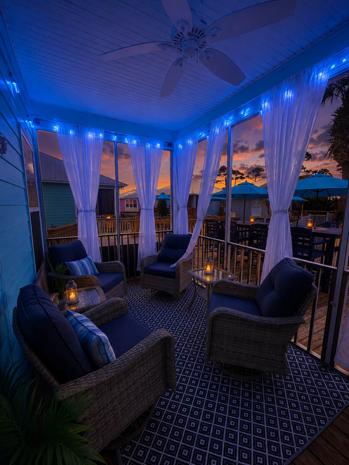 Screened porch overlooking the pool at sunset